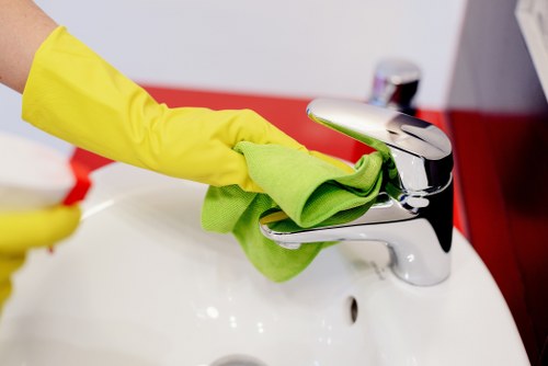 Deep cleaning a hard floor surface in Shoreditch with careful equipment